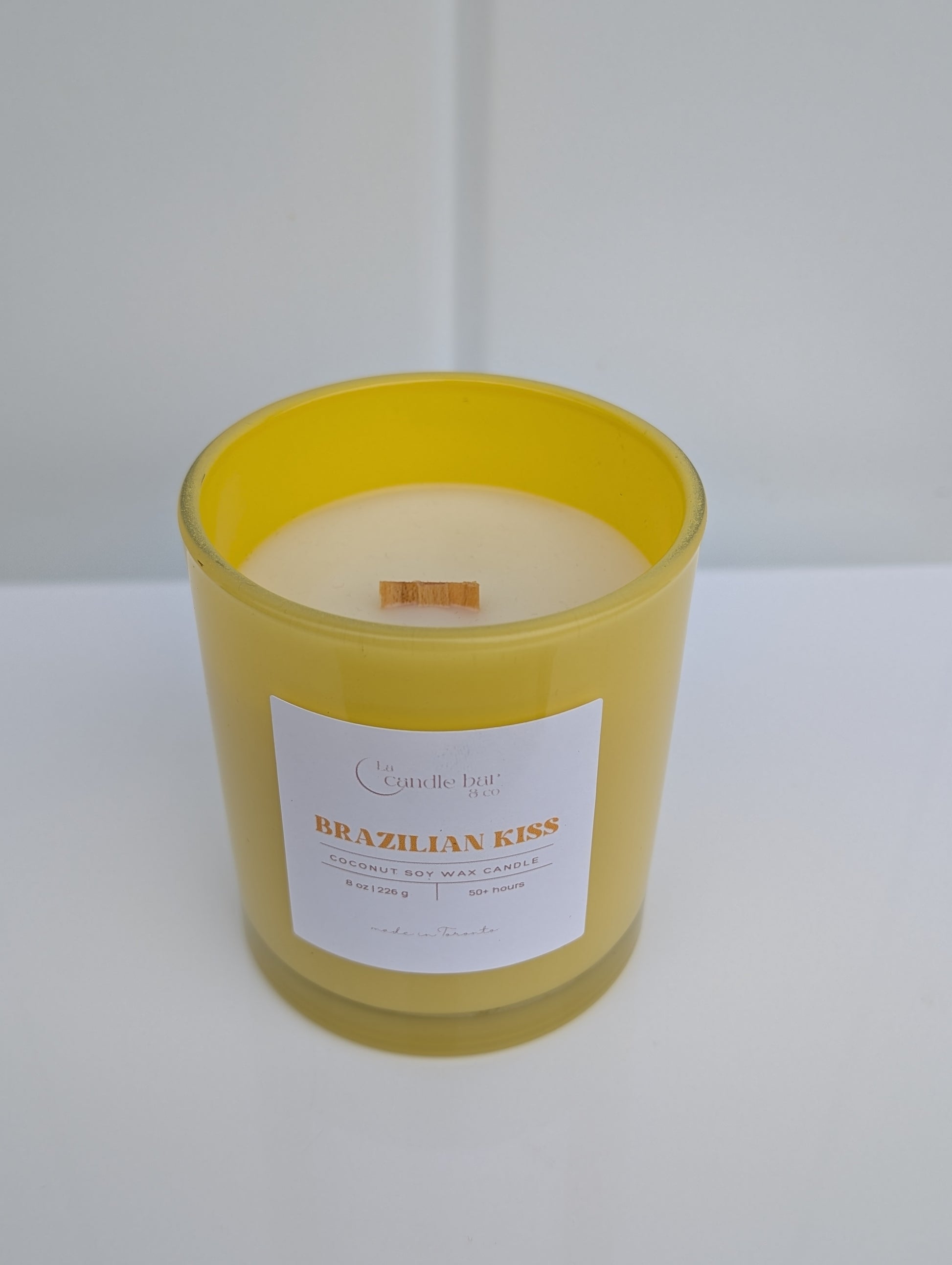 Luxury gourmand candle with pistachio, coconut and caramel notes
