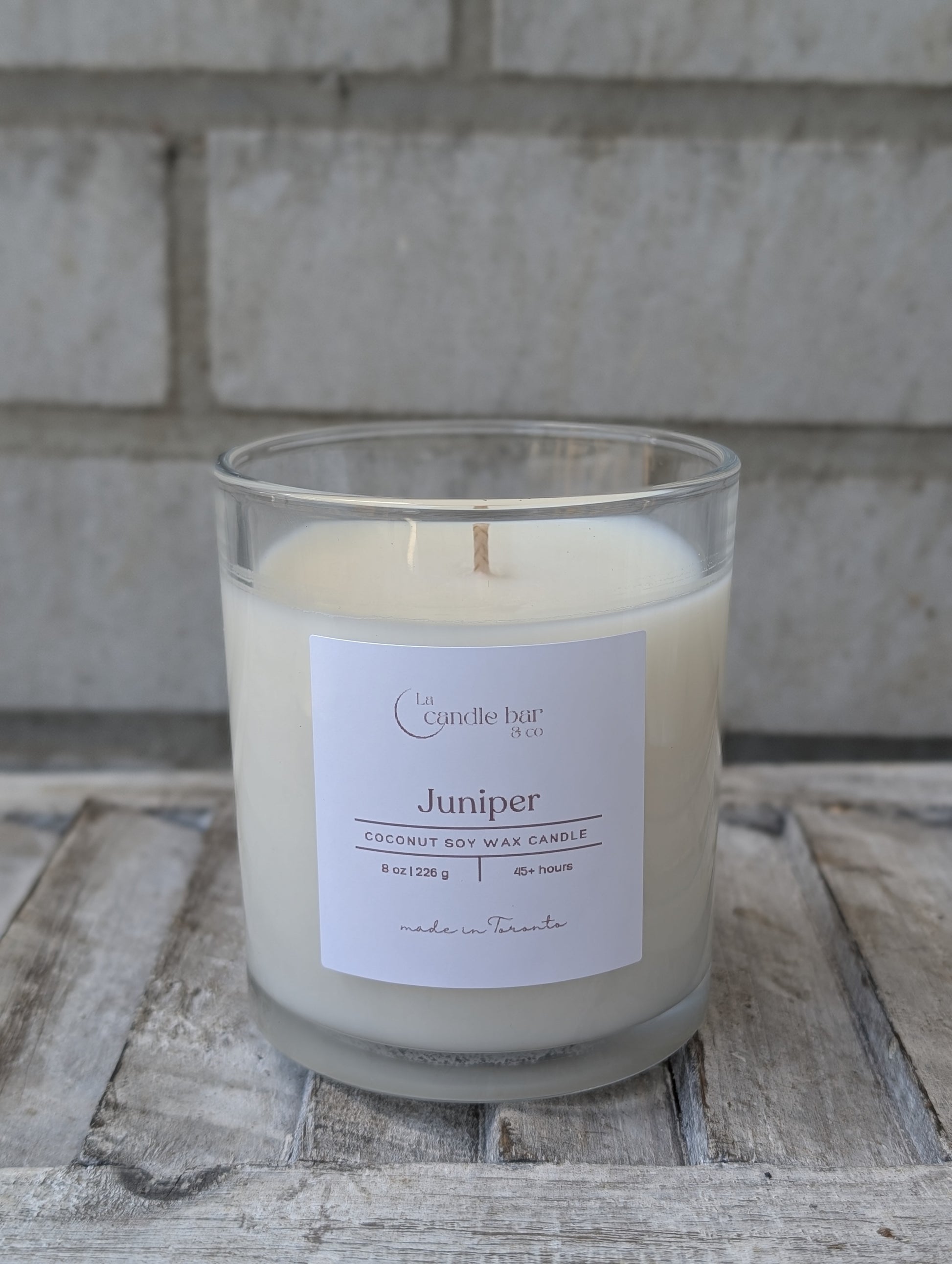 Hand-poured Juniper scented candle in a minimalist jar