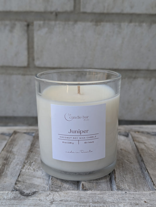Hand-poured Juniper scented candle in a minimalist jar