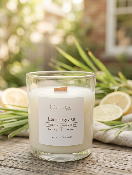 Beautifully handpoured coconut soy wax candle topped with a wooden wick.