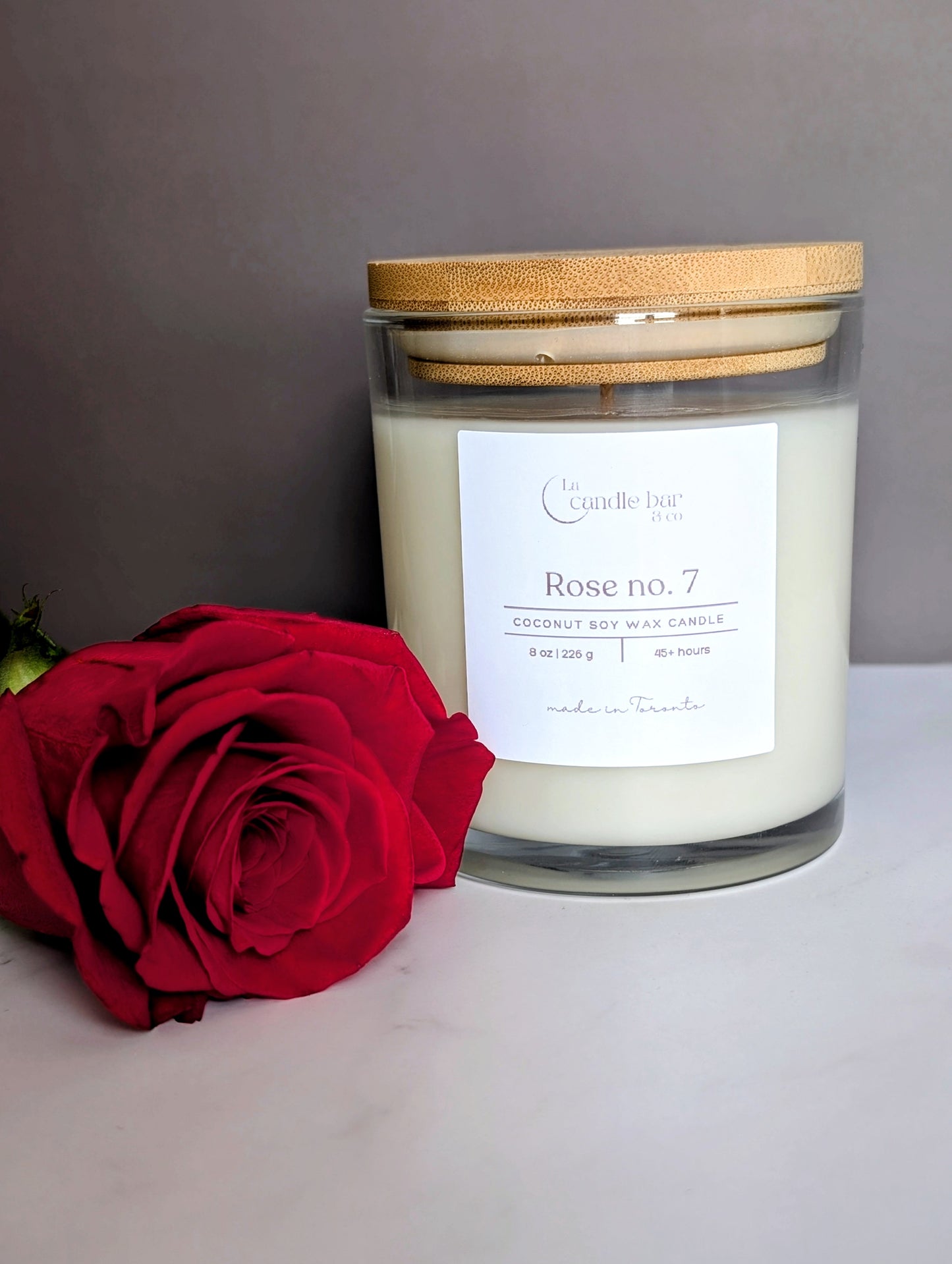 Rose No. 7 luxury rose and vanilla candle with lid, featuring creamy vanilla, soft musk, and elegant floral fragrance, perfect for gifting and home décor