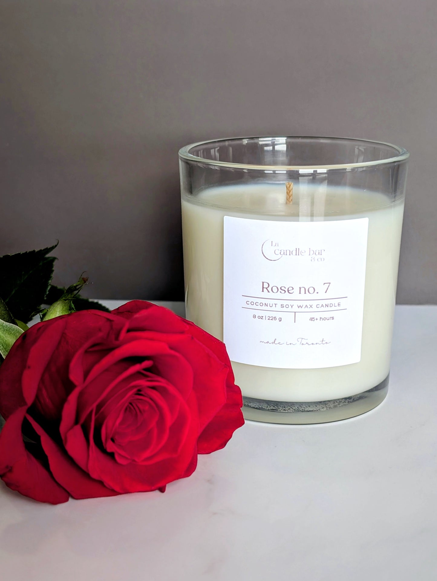 Rose No. 7 luxury candle with lush rose petals, creamy vanilla, and soft musk, perfect for gifting and home fragrance