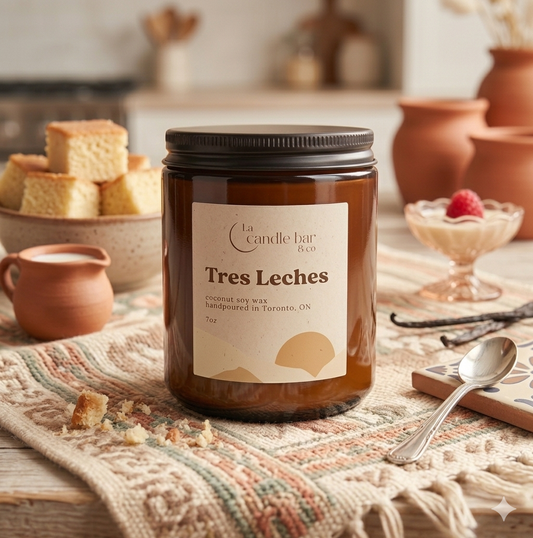 Hand-poured coconut soy wax candle topped with a wooden wick, free from parabens and.